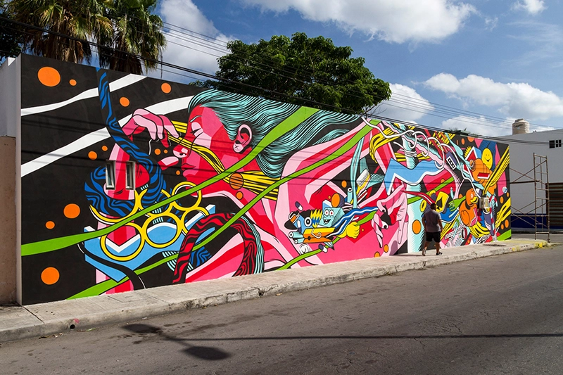 Mural do duo de artistas brasileiros Bicicleta Sem Freio, para projeto Sea Walls Cozumel