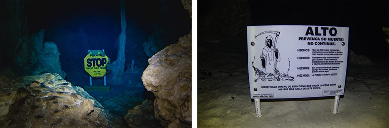 Placas de sinalização restringindo a passagem de mergulhadores sem o curso de caverna.