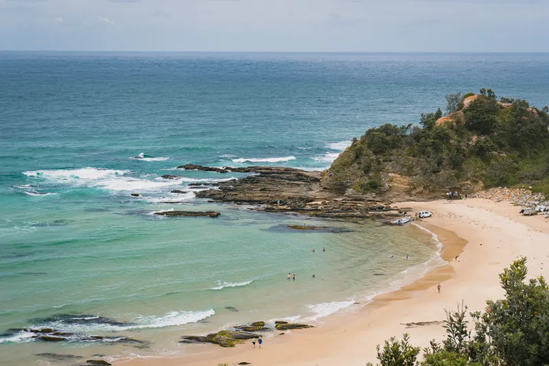 Praia e águas azuis de Nambucca Heads